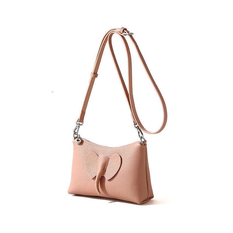 High-end designer first layer cowhide ladies spring new ladies shoulder creative slung bag.