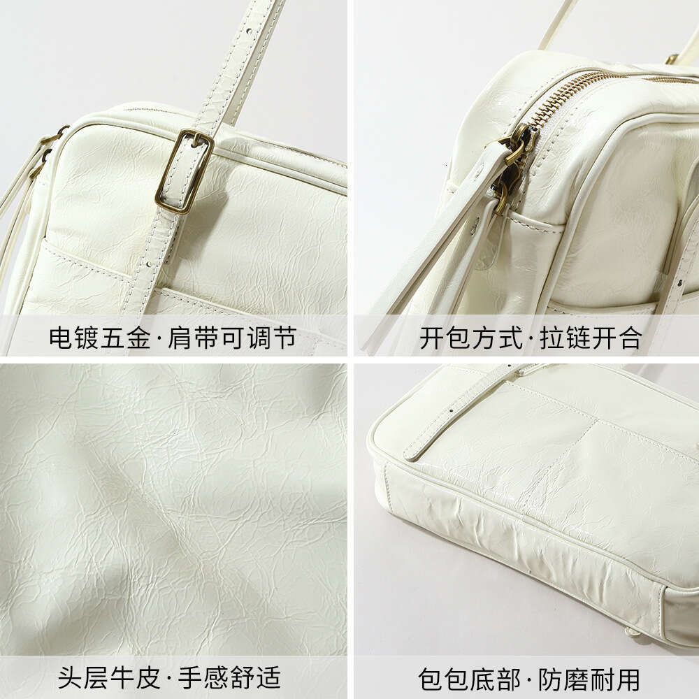 Luxury designer new ladies personality fashion authentic portable waxed leather commuting armpit Korean style large-capacity shoulder bag.