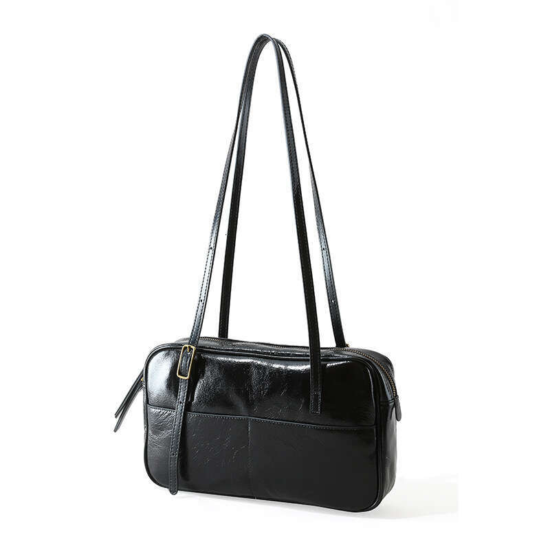 Luxury designer new ladies personality fashion authentic portable waxed leather commuting armpit Korean style large-capacity shoulder bag.