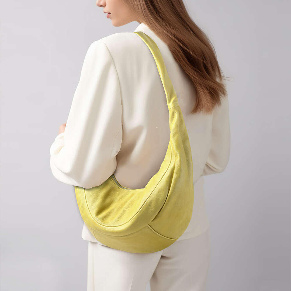 Luxury designer simple style dumplings female leather fashion trend slung commuter shoulder bag