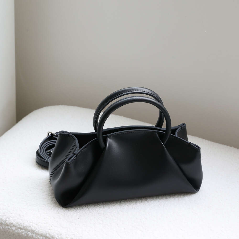 Luxury designer Korean niche lazy leather wrinkles handheld messenger cloud cowhide dumpling bag women's