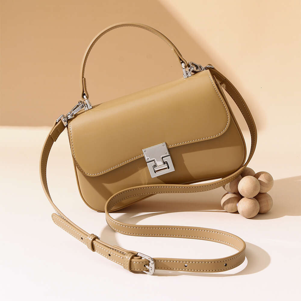 Luxury designer niche women's new cowhide portable spring fashion versatile shoulder messenger simple commuter small square bag