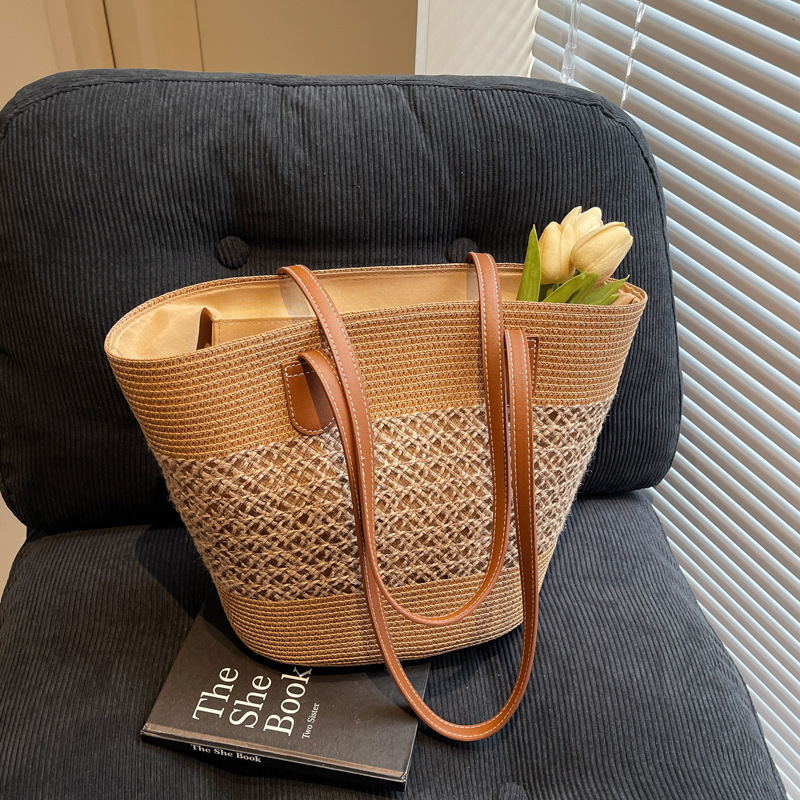 Free shipping designer Straw Beach Bag Versatile Handbag Large Capacity Shoulder Bag Basket French Style Straw Bag Bucket Tote Bag New Model