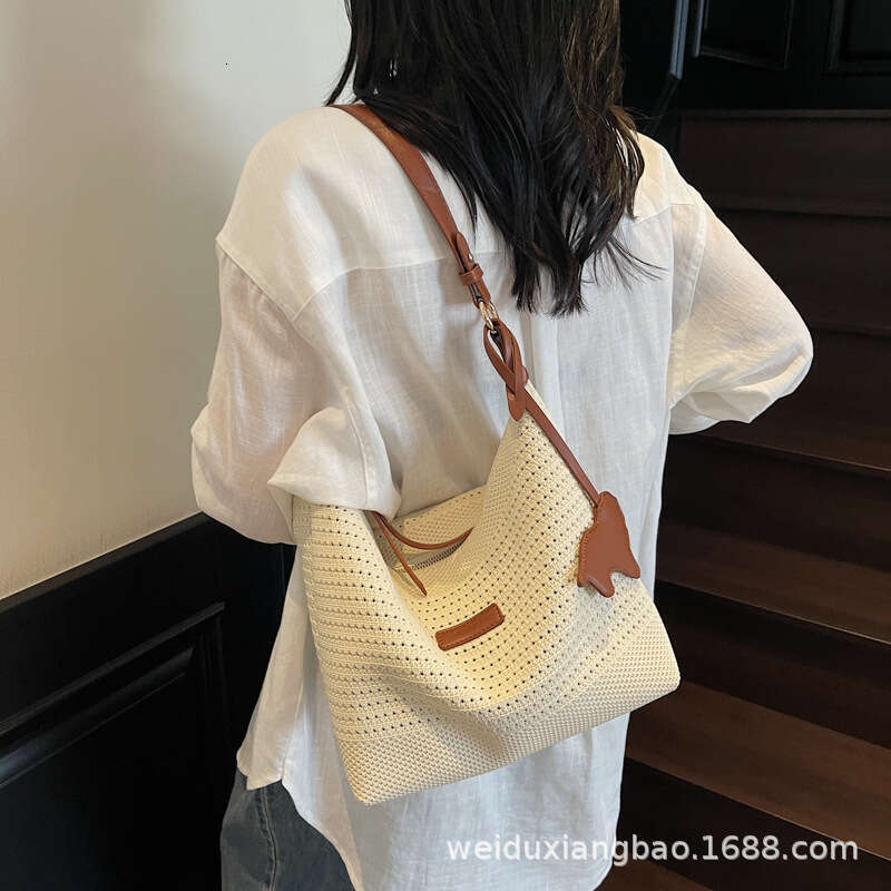 Free shipping designer bag Luxury bag 2025 Summer New Fashion High-Value Tote Women's Large Capacity Woven Straw Shoulder Crossbody Bag