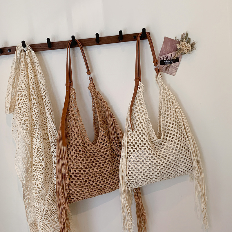 Free shipping designer Spring Summer Large Capacity Tassel Woven Bag for Women 2025 New Hollow Out Beach Vacation Beach Bag Underarm Bag Shoulder Bag