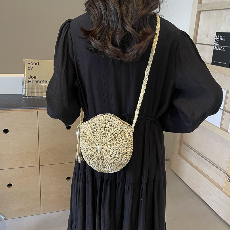 Free shipping designer Woven Small Bag for Women 2025 New Summer Tassel Straw Bag Beach Vacation Shoulder Bag Crossbody Bag Small Round Bag