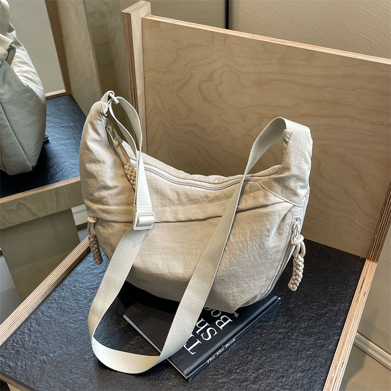 Free shipping designer Casual Dumpling Bag High-Quality Texture Versatile Large Capacity Crossbody Bag for Women New Model for Class Commuting Canvas 