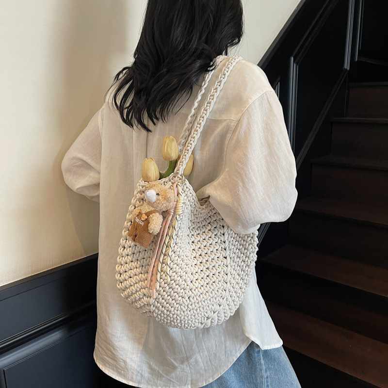 Free shipping designer Super Popular Beach Vacation Bag for Women 2025 New Commuter Tote Bag Large Capacity Hollow Woven Shoulder Bag