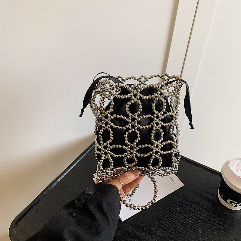 Free shipping designer Fashionable and Beautiful Spring/Summer Hollow Pearl Chain Woven Bag for Women 2025 New High-End Crossbody Bag Phone Bag