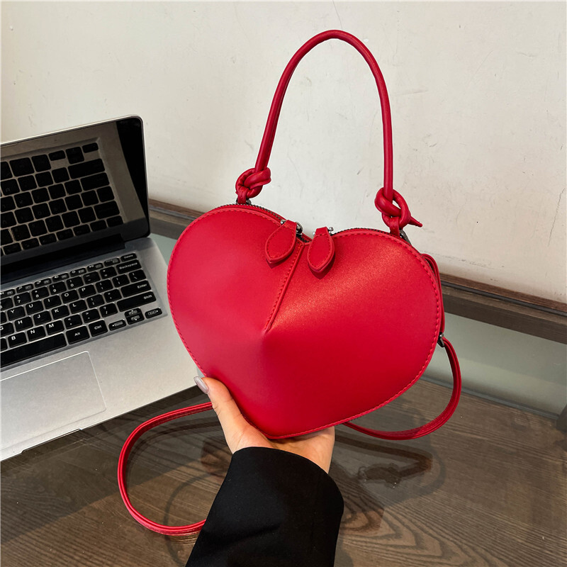 Free Shipping Designer New Super Popular Heart-shaped Love Bag Stylish Handbag Solid Color Small Peach Heart Shoulder Crossbody Phone Bag Luxury Women