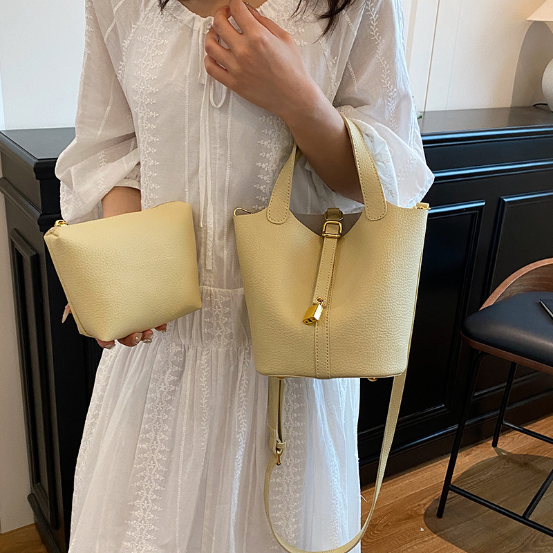 Free shipping designer Cream Yellow Basket Bag for Women 2025 New Luxury Niche High-end Commuter Handbag Crossbody Bag Bucket Bag