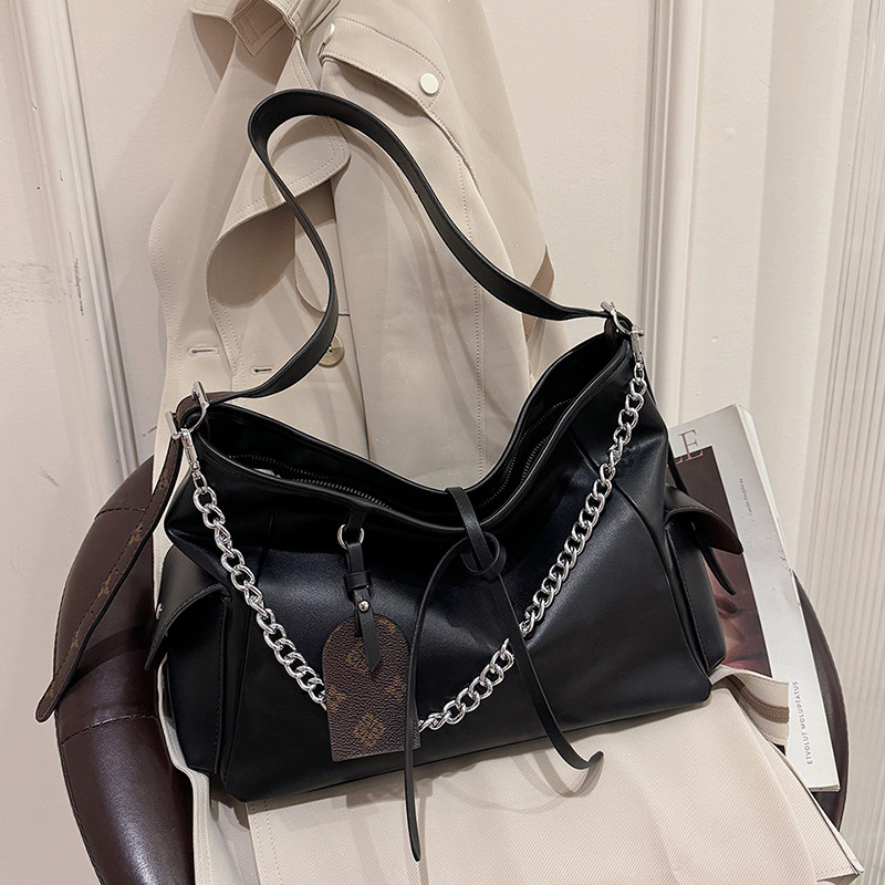 Free shipping designer Large Capacity Bag for Women New Design Bowknot Motorcycle Underarm Bag Black Commuting Bag Trendy