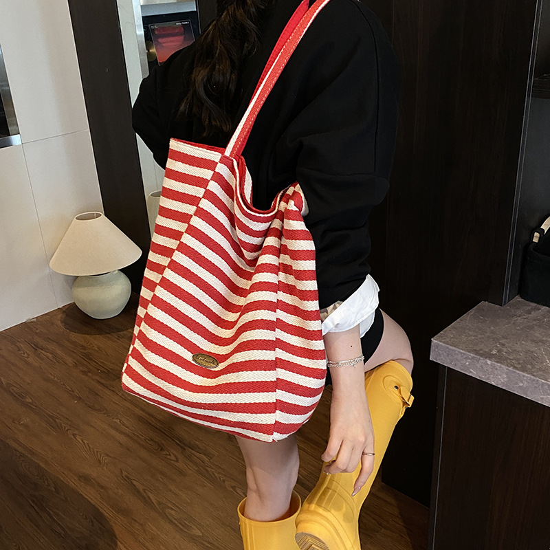 Free shipping designer Striped Canvas Bag for Women Large Capacity 2025 New Summer Versatile College Student Class Bag Simple Casual Tote Bag