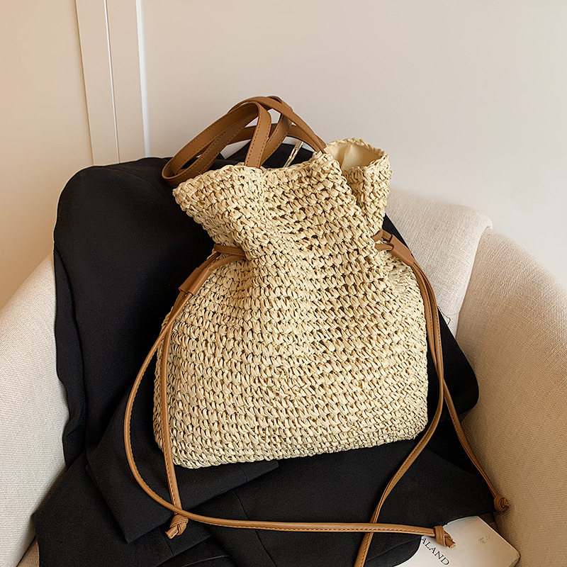 Free shipping designer Summer Lazy Style Straw Woven Single Shoulder Bag for Women 2025 New Summer Beach Vacation Large Capacity Drawstring Handbag St