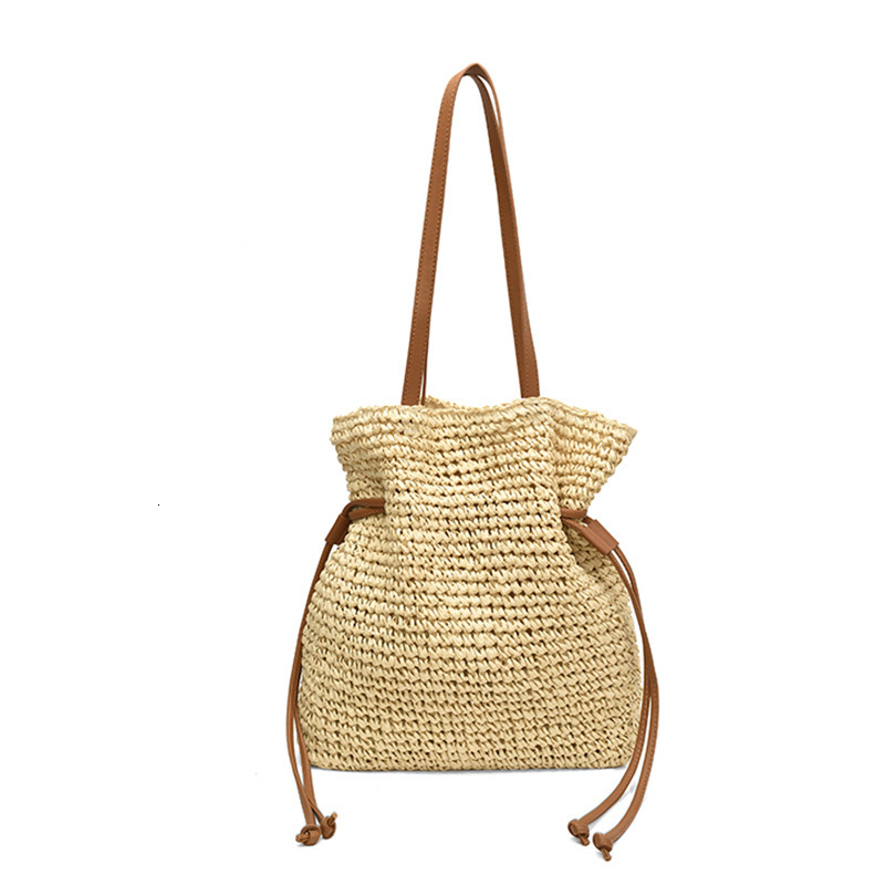 Free shipping designer Summer Lazy Style Straw Woven Single Shoulder Bag for Women 2025 New Summer Beach Vacation Large Capacity Drawstring Handbag St
