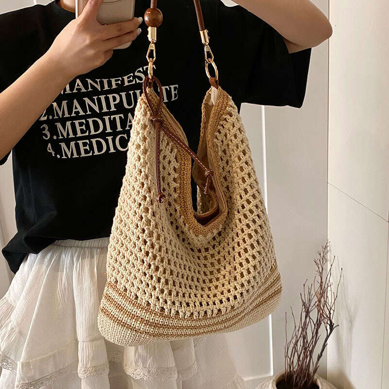 Vacation Style Woven For Women 2025 Summer New Fashion New Hollow Knit Shoulder Large Capacity Commuter Tote Bag