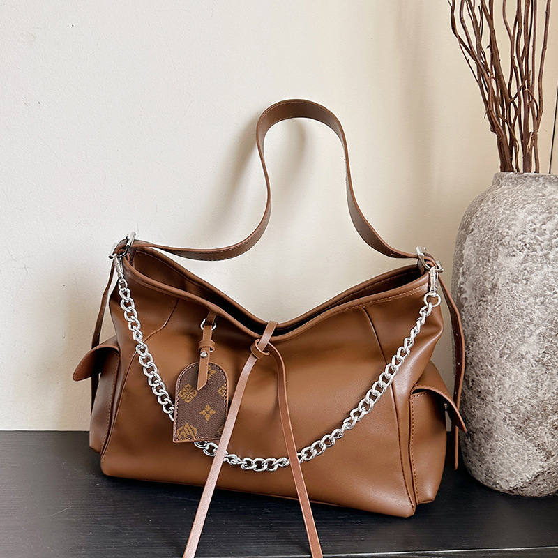 Free shipping designer Large Capacity Bag for Women New Design Bowknot Motorcycle Underarm Bag Black Commuting Bag Trendy