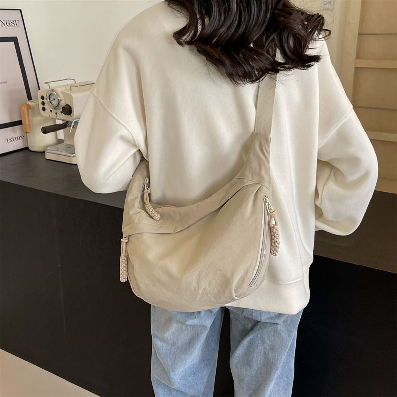 Free shipping designer Casual Dumpling Bag High-Quality Texture Versatile Large Capacity Crossbody Bag for Women New Model for Class Commuting Canvas 