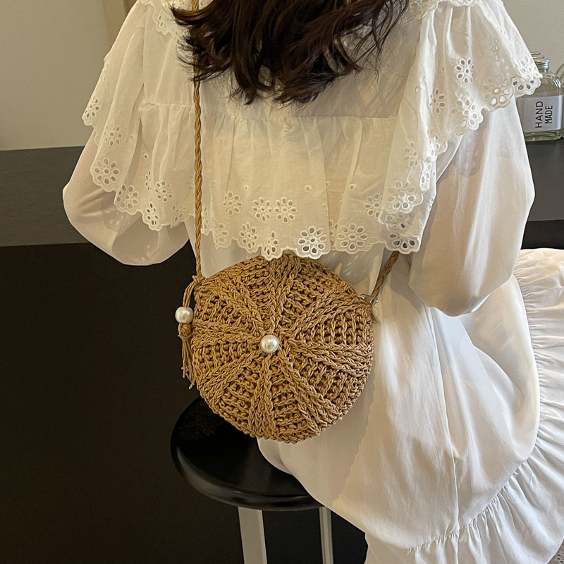 Free shipping designer Woven Small Bag for Women 2025 New Summer Tassel Straw Bag Beach Vacation Shoulder Bag Crossbody Bag Small Round Bag