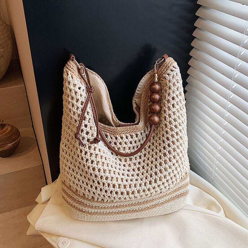 Vacation Style Woven For Women 2025 Summer New Fashion New Hollow Knit Shoulder Large Capacity Commuter Tote Bag