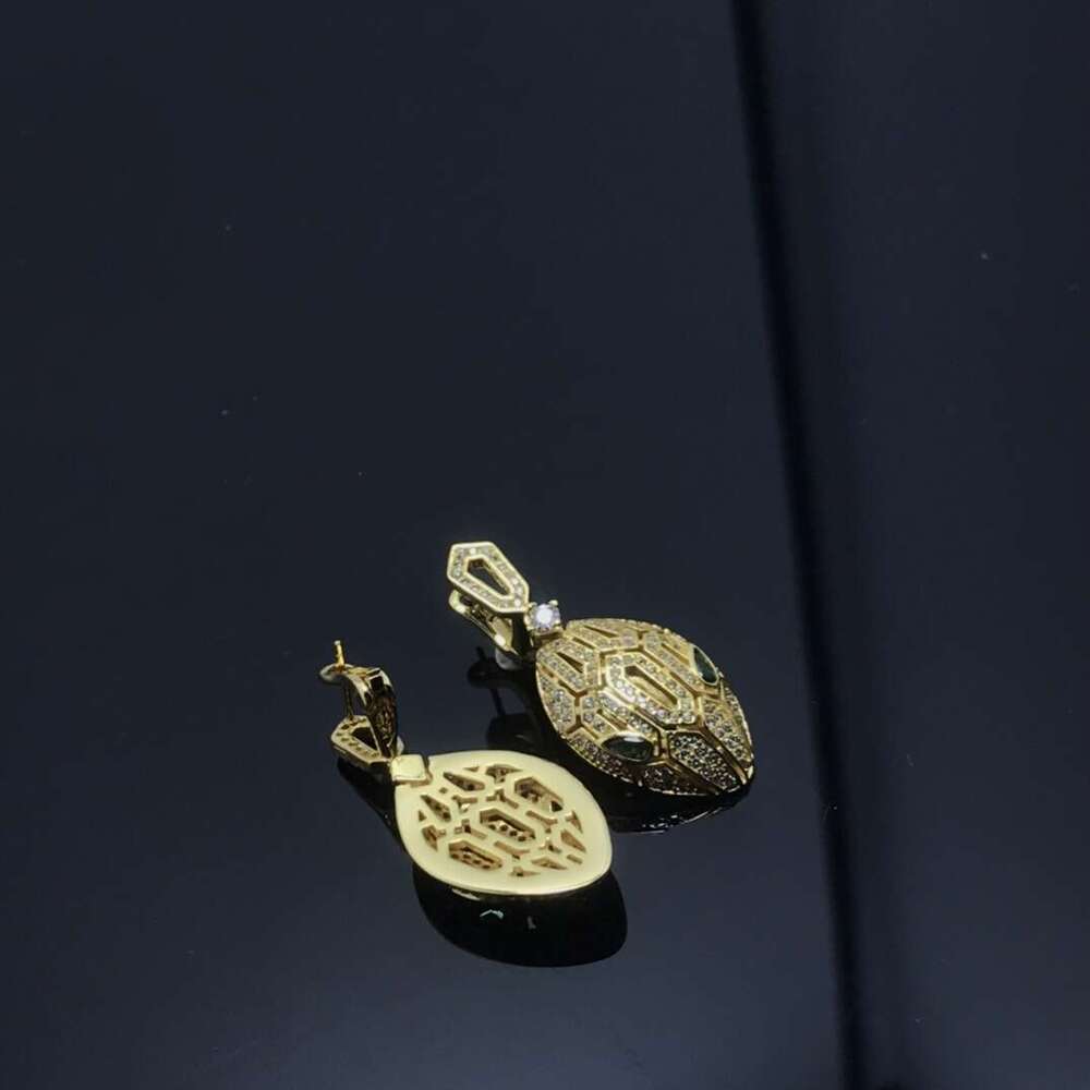 DHcollections New Style Head Full V Gold High Version Elastic Inlaid Dia Snake Series Earrings Ear Studs
