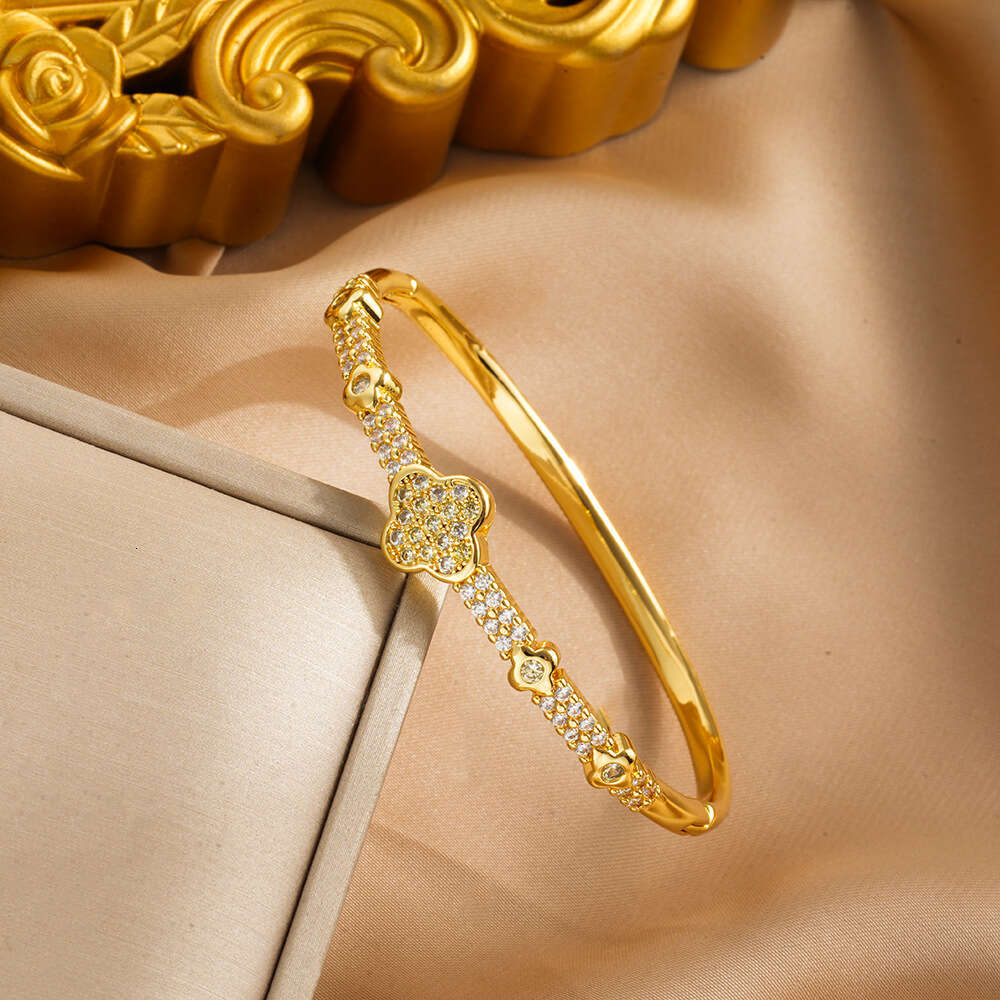 DHcollections New Full Zircon Bracelet Open High-end Design with Inlaid Dias for Women Four-leaf Clover Non-fading