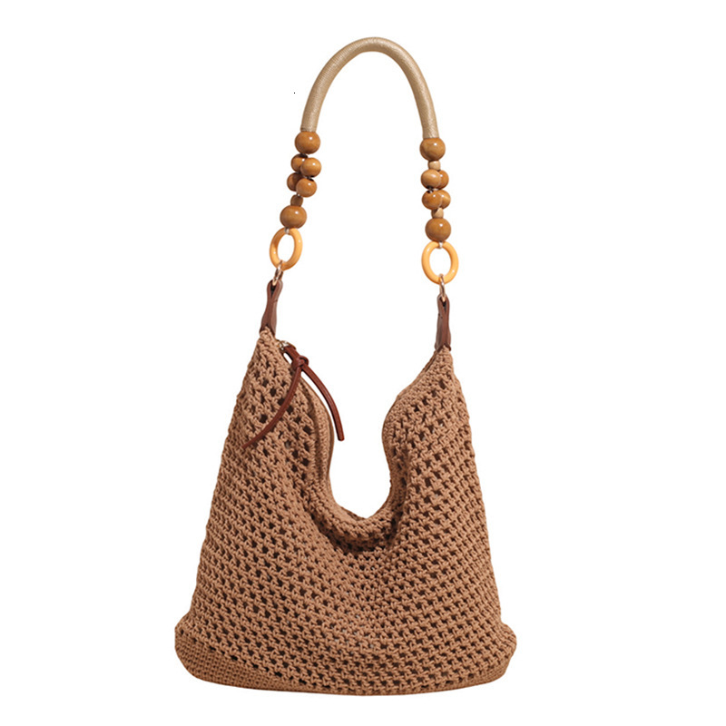 Free shipping designer Beach Vacation Beach Bag for Women 2025 New Summer Large Capacity Hollow Woven Bag Shoulder Bag Crossbody Bag Tote Bag Trendy