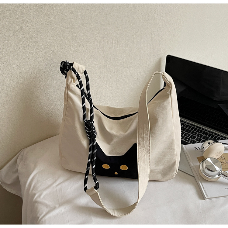 Free shipping designer Casual Cute Lightweight Cat Canvas Bag for Women 2025 New Large Capacity Commuter Tote Bag High-end Feel Shoulder Bag