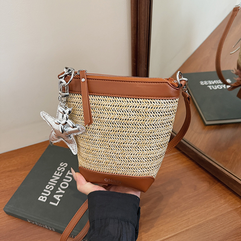 Free shipping designer Bohemian Straw Small Bag for Women 2025 New Summer Fashion Woven Crossbody Bag Trendy Bucket Bag