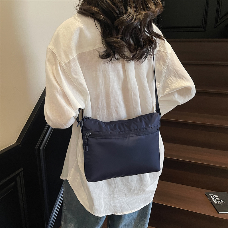 Free shipping designer New Fashion Lightweight Stylish Women Small Bag Korean Version Casual Bucket Bag Versatile Crossbody Bag Women Bag