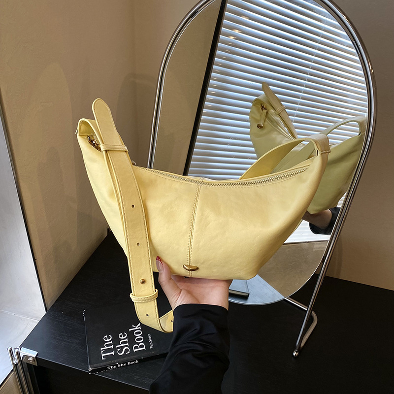 Free shipping designer Korean Version High-Quality Simple Casual Versatile Shoulder Bag Commuter Bag for Women 2025 Summer New Crossbody Dumpling Bag