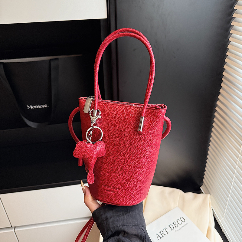 Free shipping designer Summer Super Hot Yellow Bucket Bag Women 2025 New Light Luxury Niche Design High-end Crossbody Bag Phone Bag