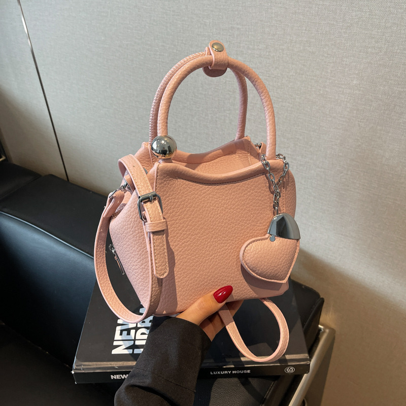 Free shipping designer Pink Handbag Small Tote Bag for Women 2025 New Spring Light Luxury Niche High-End Crossbody Bag Basket Bag Bucket Bag