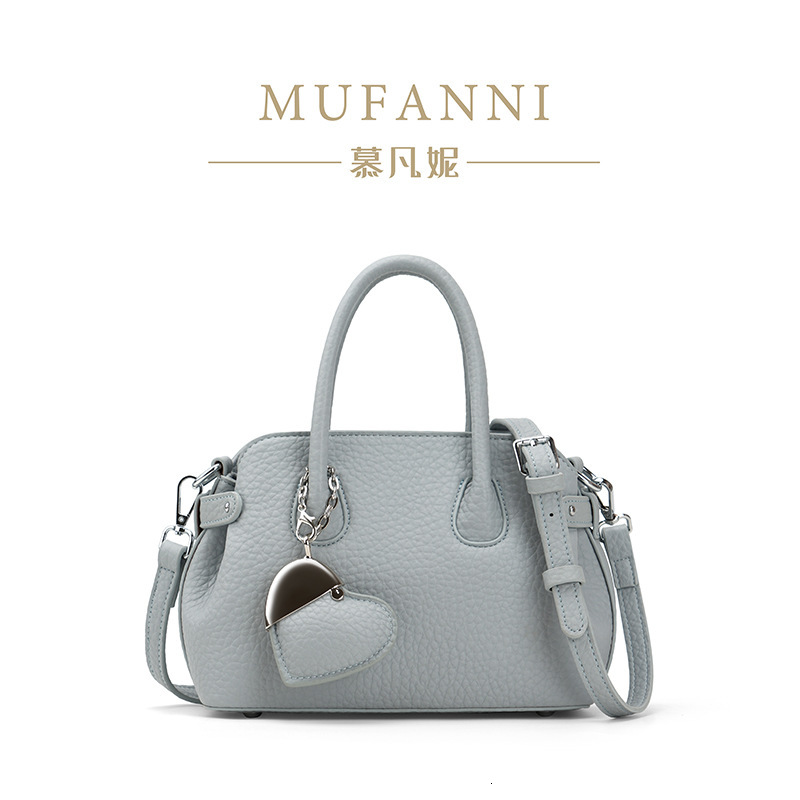 Free shipping designer 2025 New Luxury Niche Design High-Quality Crossbody Bag Handbag Women Bag Bowling Bag Shell Bag