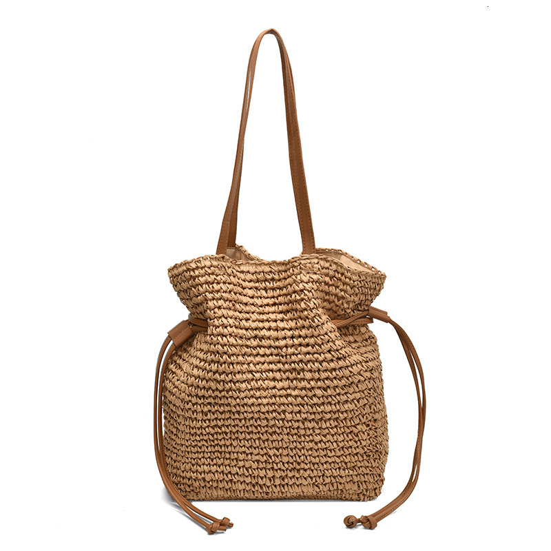 Free shipping designer Summer Lazy Style Straw Woven Single Shoulder Bag for Women 2025 New Summer Beach Vacation Large Capacity Drawstring Handbag St