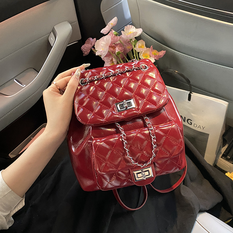 Free shipping designer Korean Style College Wind Backpack for Women Casual Fashion Diamond Chain Bucket Bag Lightweight Small Travel Backpack
