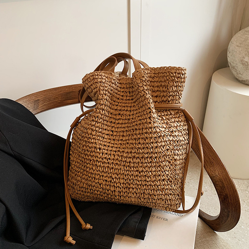 Free shipping designer Summer Lazy Style Straw Woven Single Shoulder Bag for Women 2025 New Summer Beach Vacation Large Capacity Drawstring Handbag St