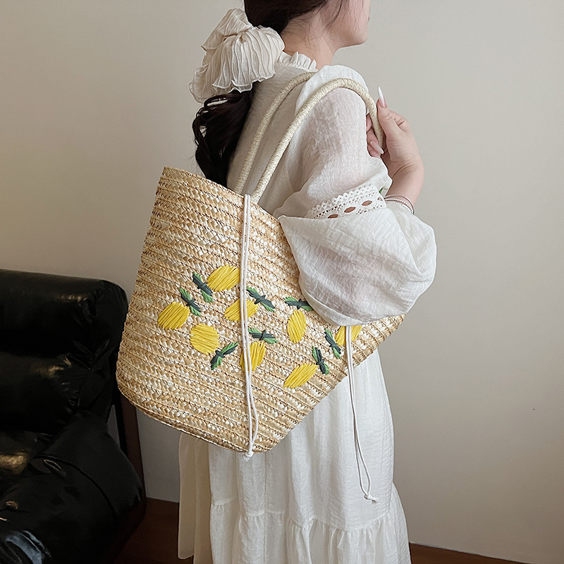 Free shipping designer 2025 New Straw Bag for Women Versatile Shoulder Bag High-End Commuter Handbag Tote Bag Lemon Embroidery Woven Bag