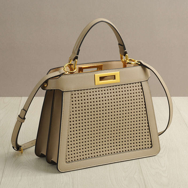 Leather Bag Bucket Bag New Style Wind Organ Cowhide Women S Hollow Cat Handbag Twist Lock Tote Handheld Shoulder Bag Trendy Tote Bag