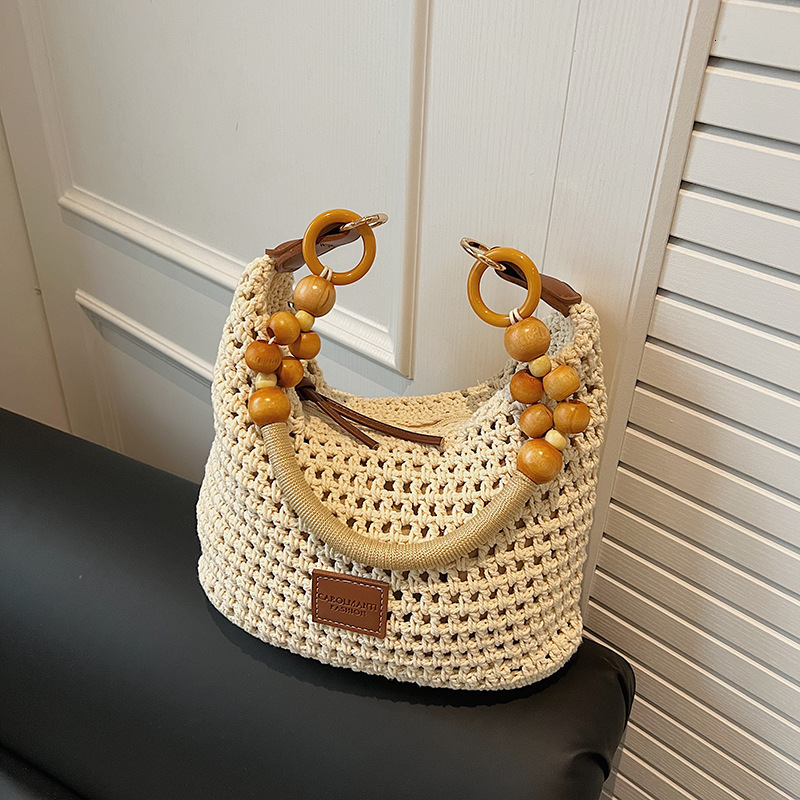 Free shipping designer Beach Vacation Beach Bag for Women 2025 New Summer Large Capacity Hollow Woven Bag Shoulder Bag Crossbody Bag Tote Bag Trendy