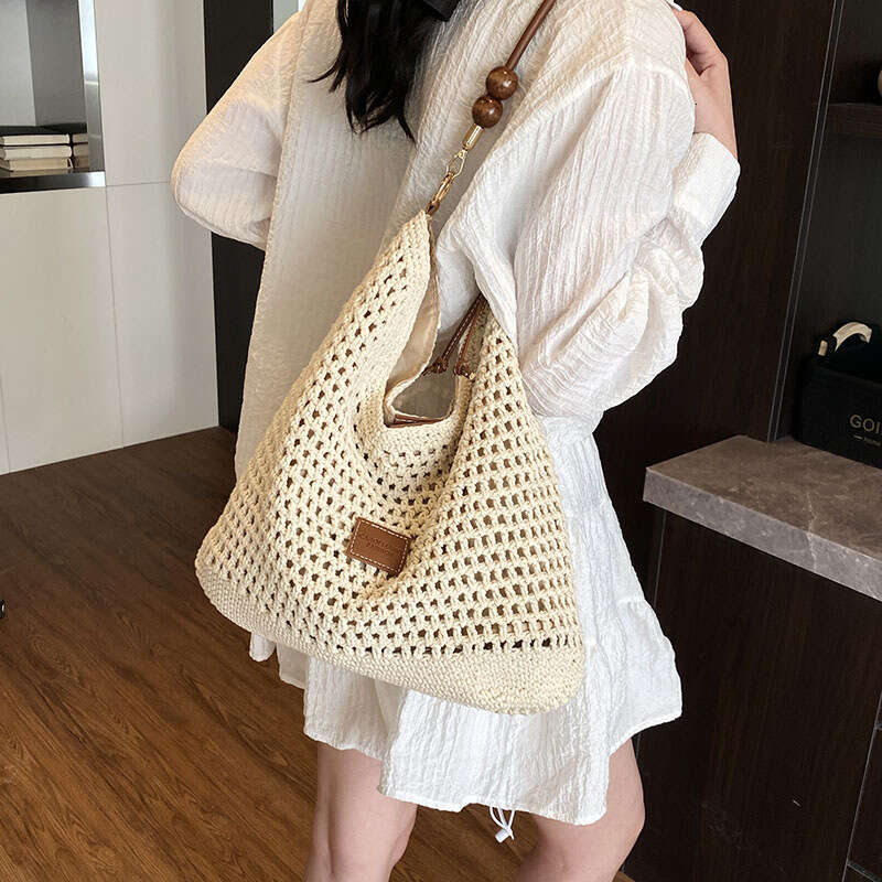 Vacation Style Woven For Women 2025 Summer New Fashion New Hollow Knit Shoulder Large Capacity Commuter Tote Bag