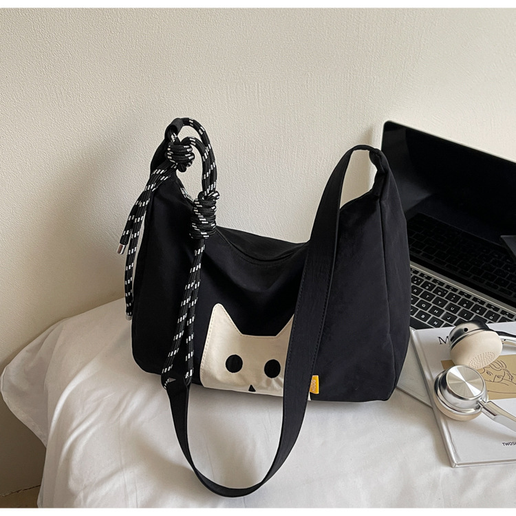 Free shipping designer Casual Cute Lightweight Cat Canvas Bag for Women 2025 New Large Capacity Commuter Tote Bag High-end Feel Shoulder Bag