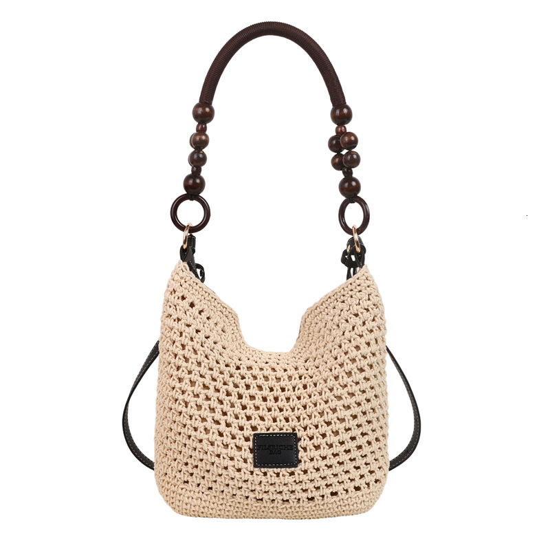 Free shipping designer Beach Vacation Beach Woven Bag for Women 2025 New Summer Hollow Knitted Handbag Large Capacity Shoulder Bag Straw Bag