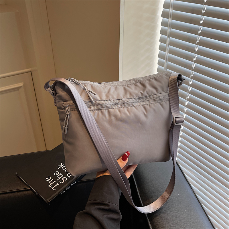 Free shipping designer New Fashion Lightweight Stylish Women Small Bag Korean Version Casual Bucket Bag Versatile Crossbody Bag Women Bag