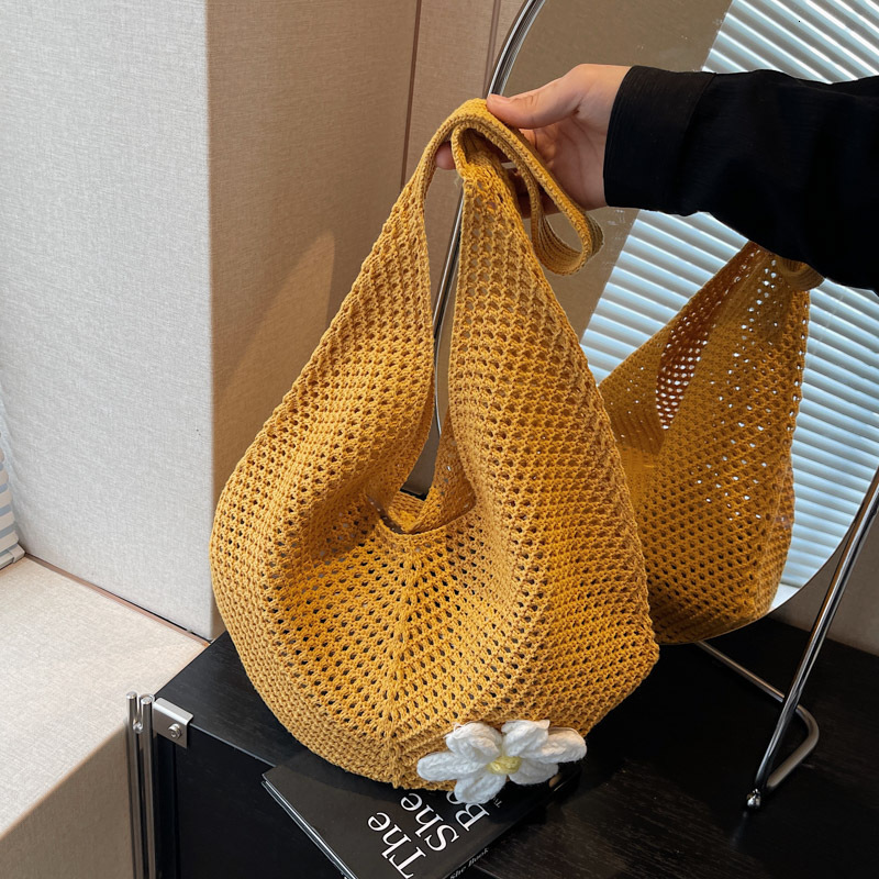 Free shipping designer Woven Straw Bag for Women Large Capacity 2025 New Spring Summer Niche Shoulder Bag Hollow Out High-End Feel Beach Bag