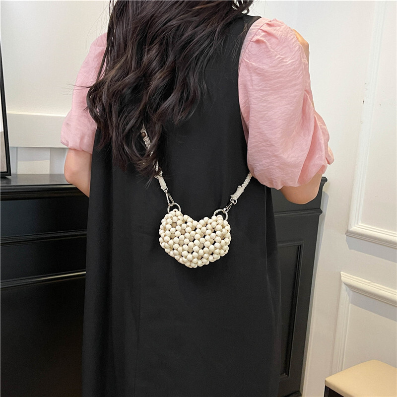 Free shipping designer Summer Dopamine Personality Decorative Beaded Mini Crossbody Bag Small Bag 2025 New Niche Mini Heart Bag