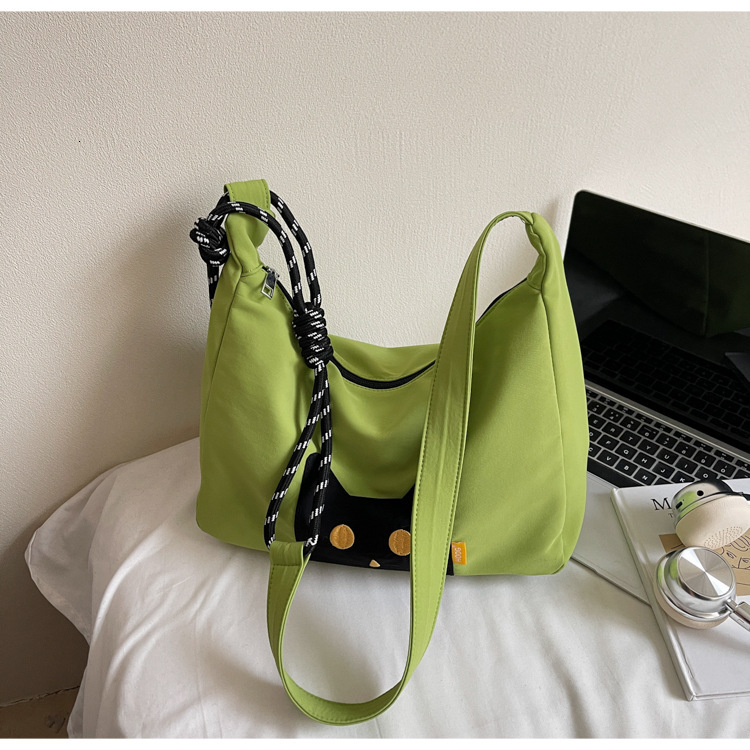 Free shipping designer Casual Cute Lightweight Cat Canvas Bag for Women 2025 New Large Capacity Commuter Tote Bag High-end Feel Shoulder Bag