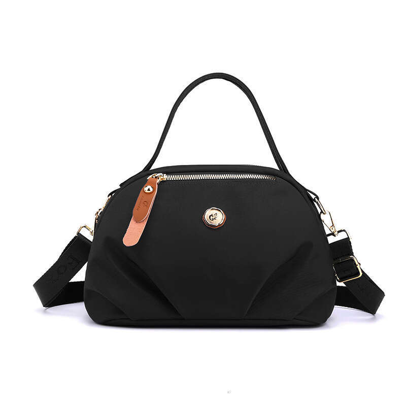 New shoulder bag women's hand-held dumpling bag mobile phone bag large capacity fashionable and casual