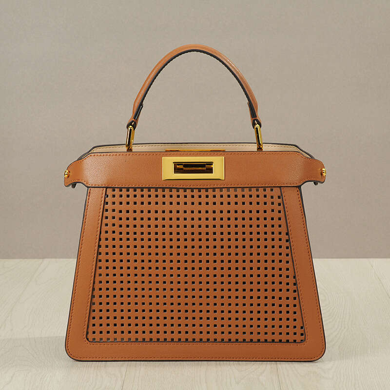 Leather Bag Bucket Bag New Style Wind Organ Cowhide Women S Hollow Cat Handbag Twist Lock Tote Handheld Shoulder Bag Trendy Tote Bag