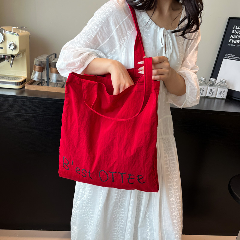 Free shipping designer Canvas Bag for Women Large Capacity 2025 New Summer Versatile Simple Shoulder Bag Tutoring Bag College Student Class Tote Bag